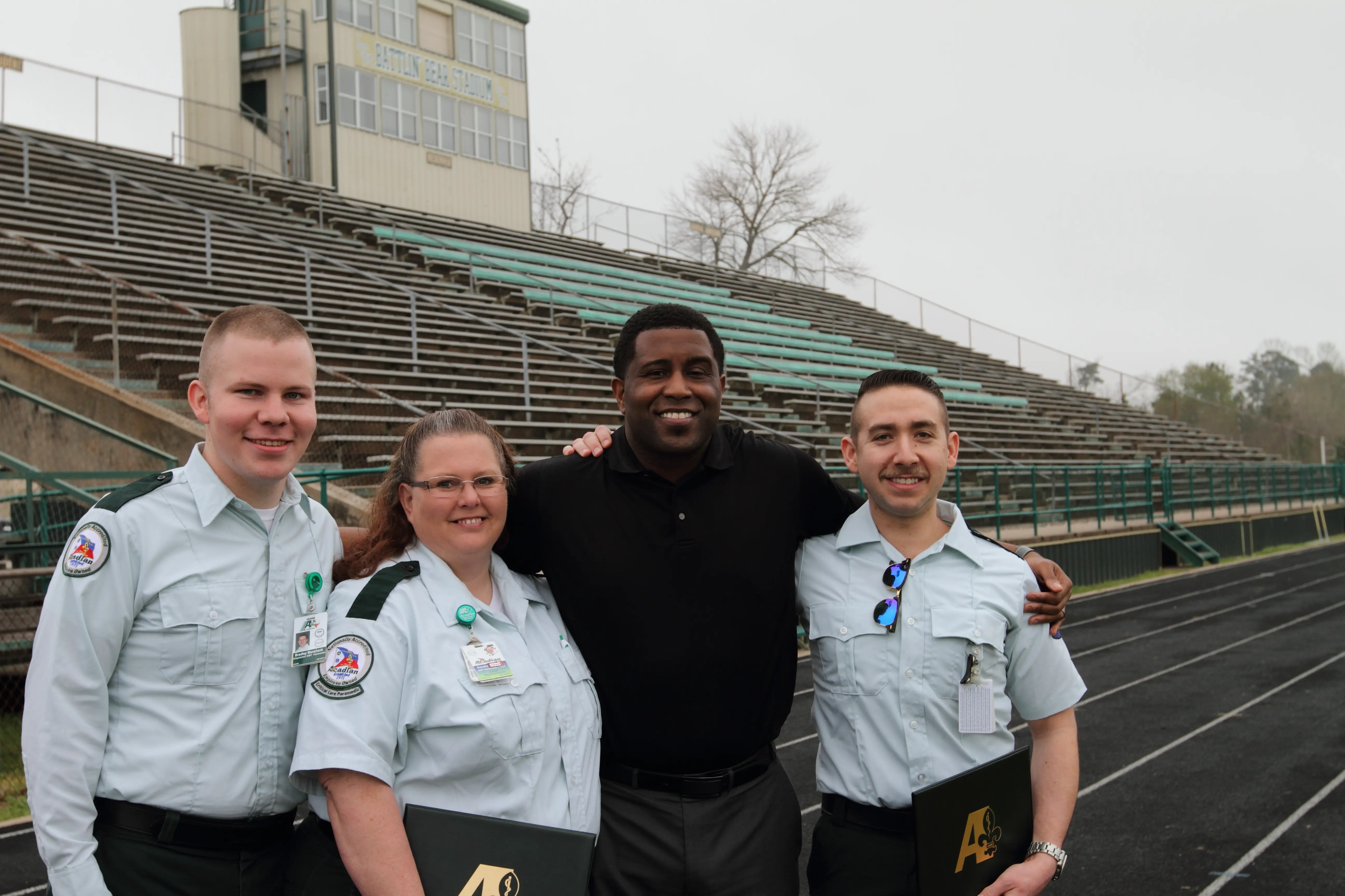 Medics reunite with patient at local track & field